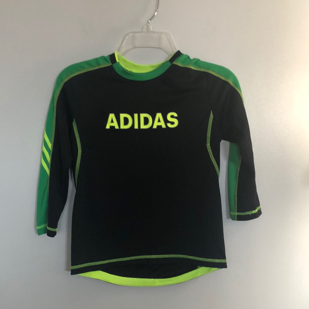 Adidas youth athletic shirt, NWOT, size 7.